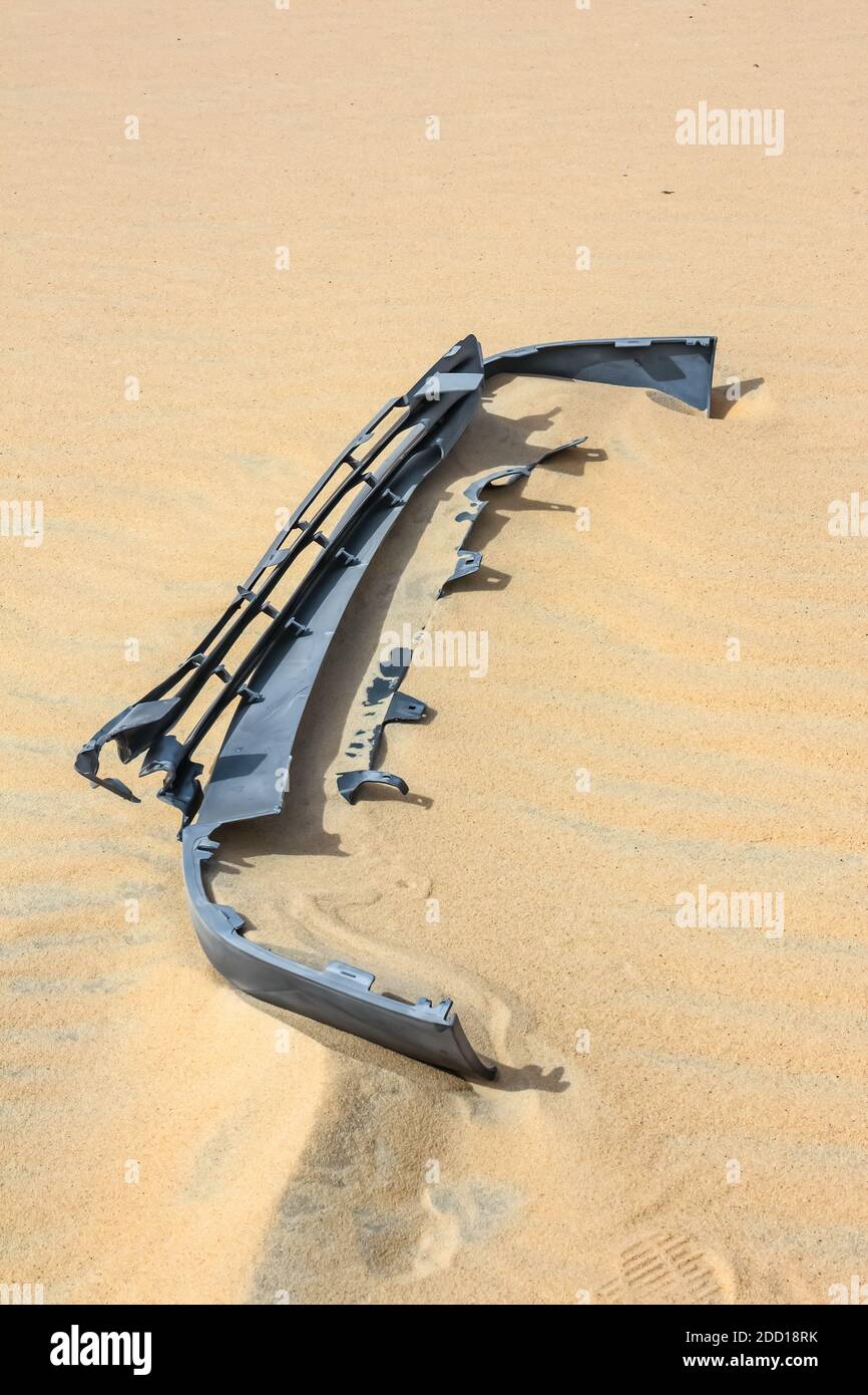 Abandoned car bumper in the Saudi Arabian desert. Stock Photo