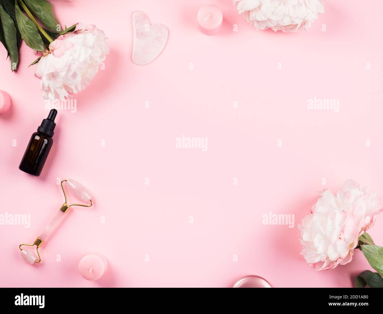 Pink beauty skin care background with flowers Stock Photo - Alamy