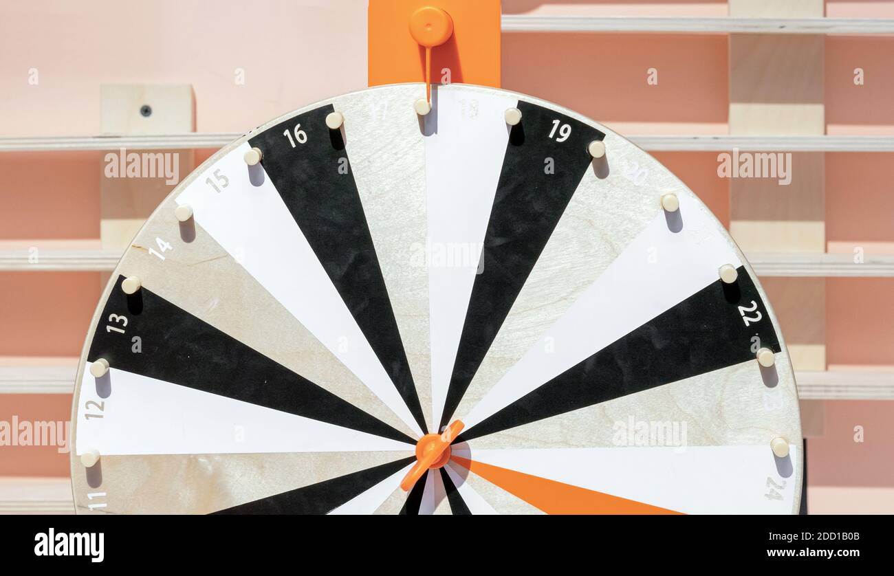 Children's wooden roulette with numbers. Roulette wheel Stock Photo - Alamy