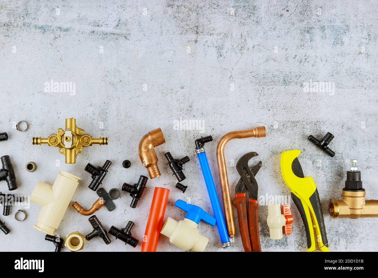 Plumbers various tools and plumbing materials including in the