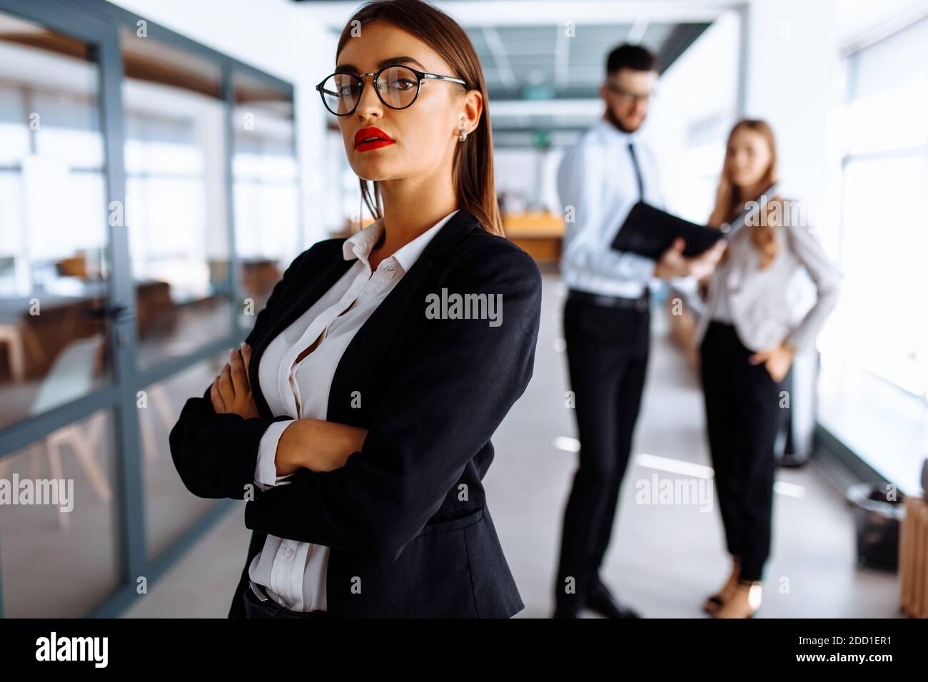 Business young woman, group of people in the background in modern ...