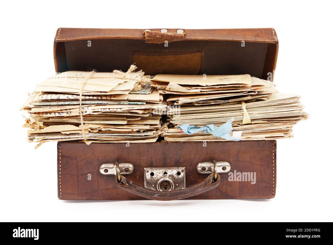 Bunches of paper mails of 20 century in the vintage suitcase, isolated on white Stock Photo