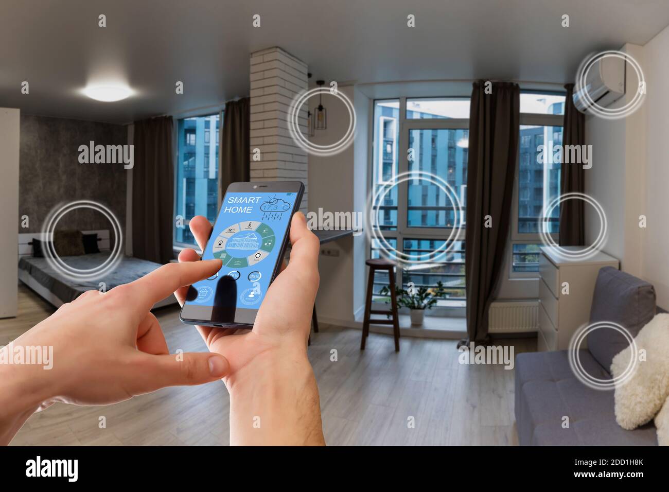 Smart home technology interface on smartphone app screen with augmented reality AR view of