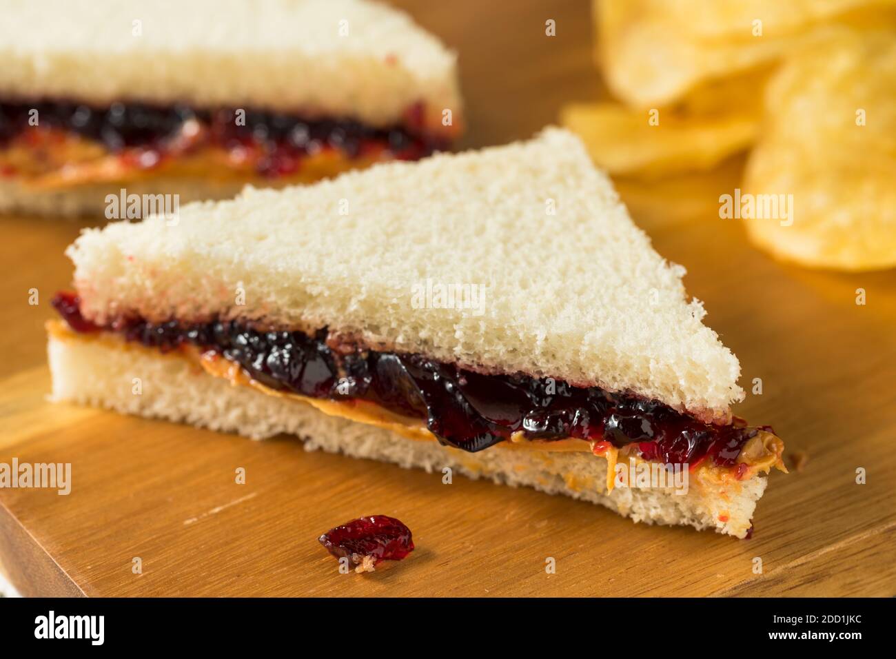 Homemade Crustless Peanut Butter and Jelly Sandwich with Chips Stock ...