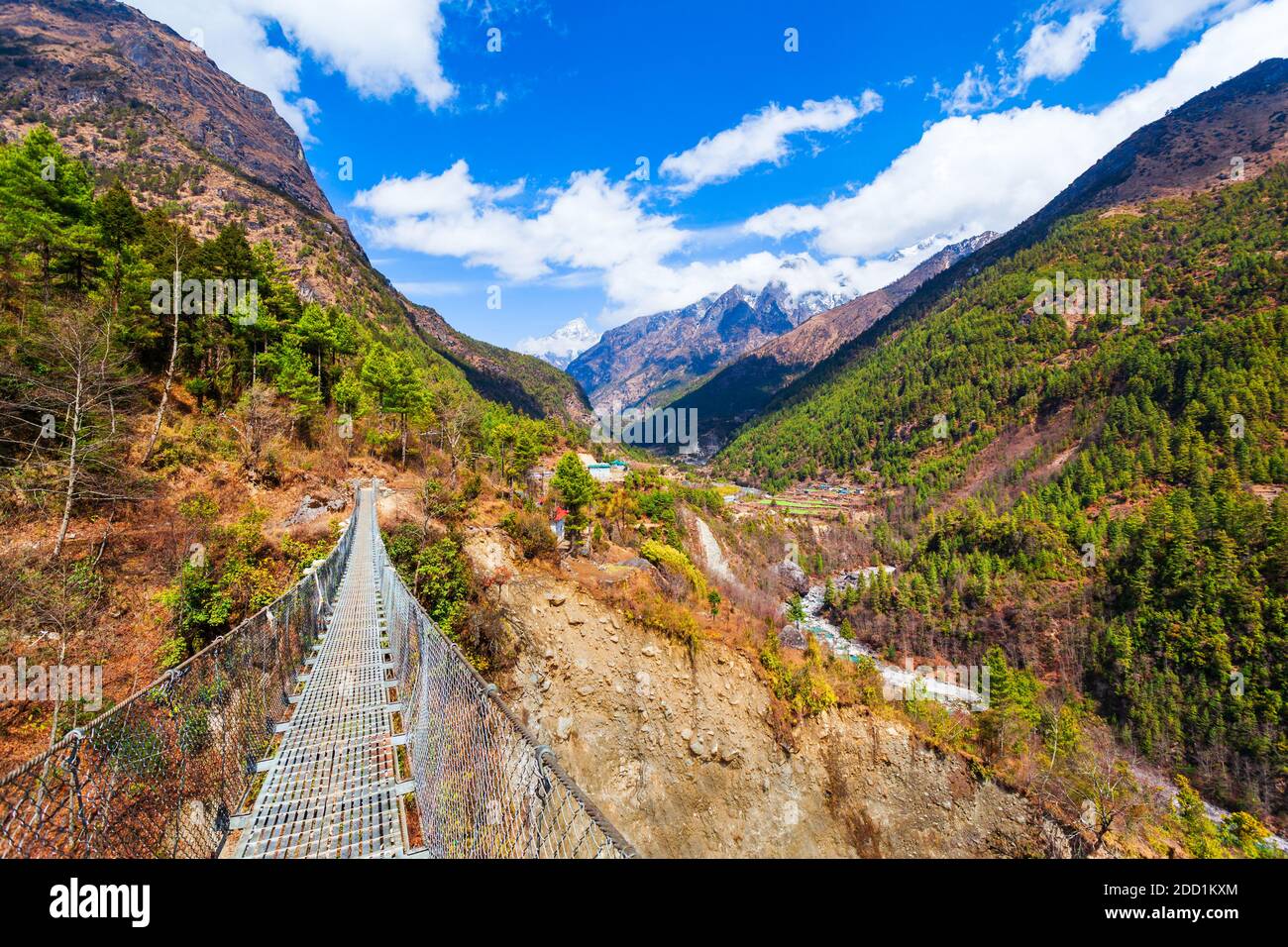 Bridge through the river in Everest or Khumbu region in Himalaya mountains, Nepal Stock Photo