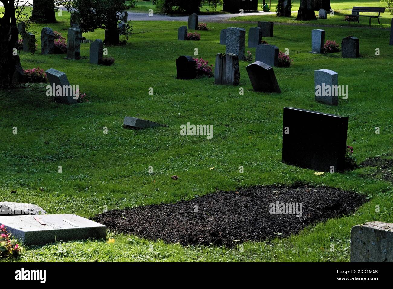 A newly dug grave in a cemetery hires stock photography and images Alamy