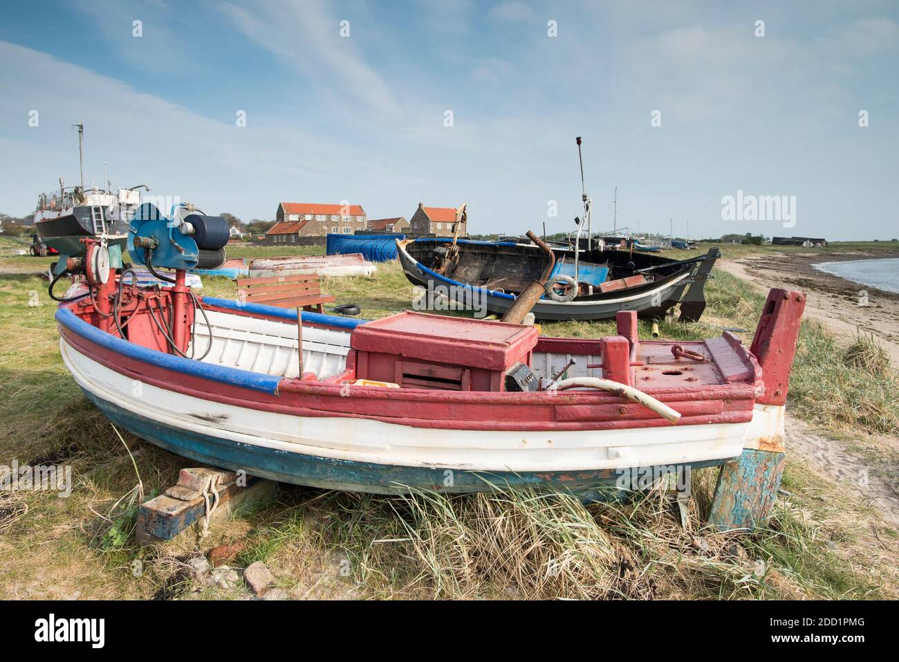 Fishing boats on the Holy island of Lindisfarne, England. Stock Photo