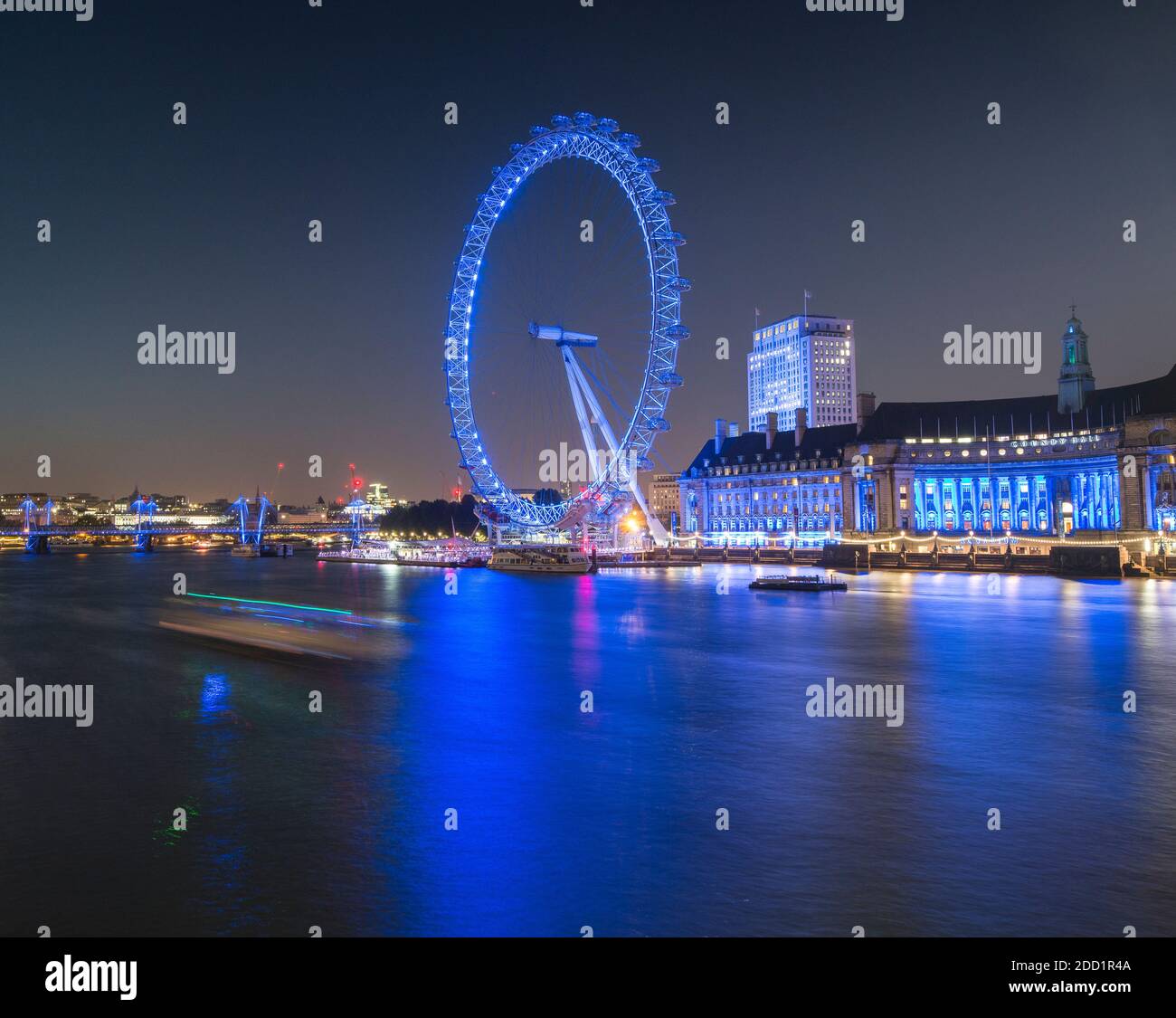 Twilight at the London Eye along the River Thames at sunset in London, England. Stock Photo