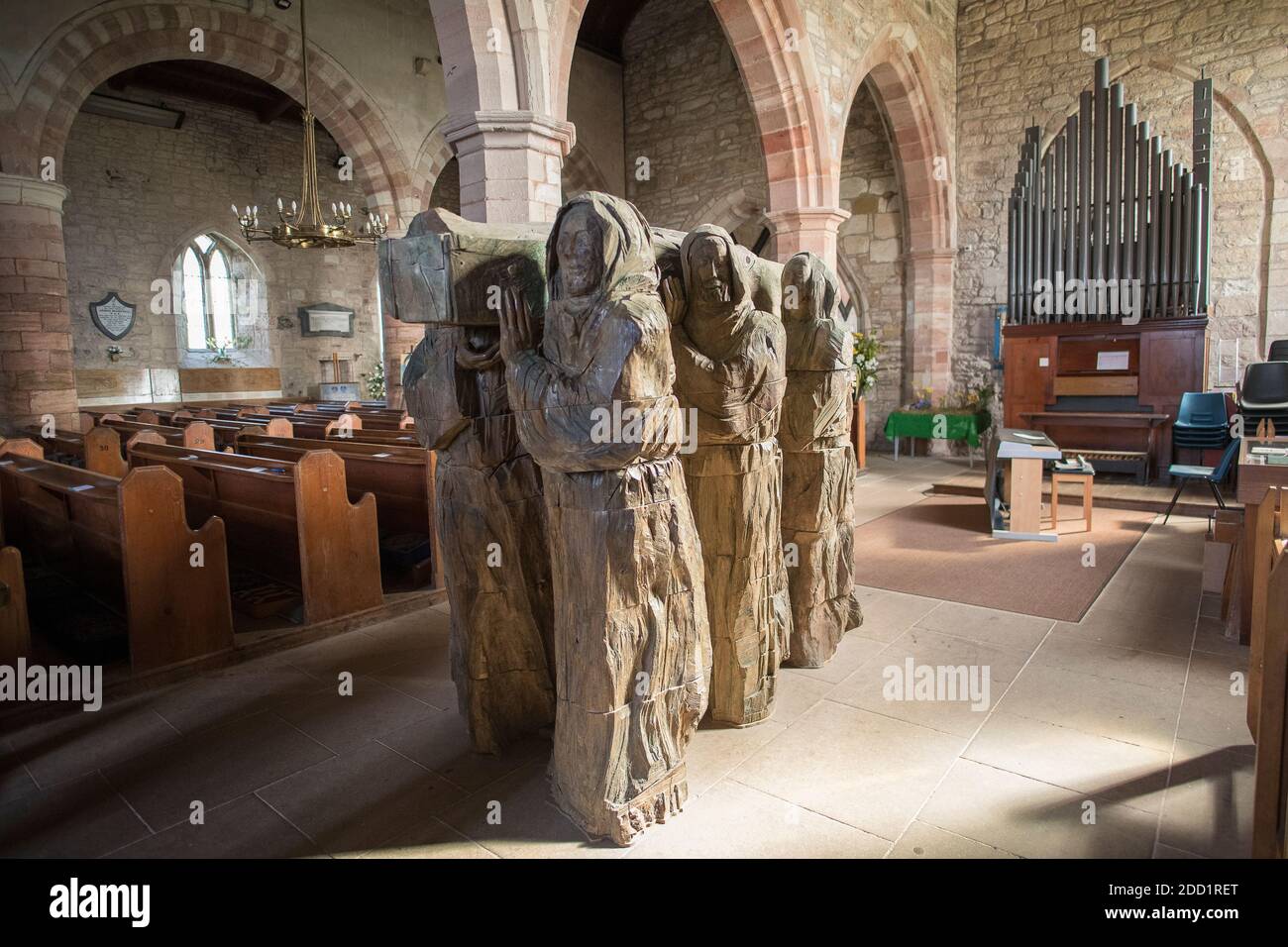 The Journey a wooden sculpture inside of St Mary's Church on the Holy Island of Lindisfarne, Northumberland, England. Stock Photo