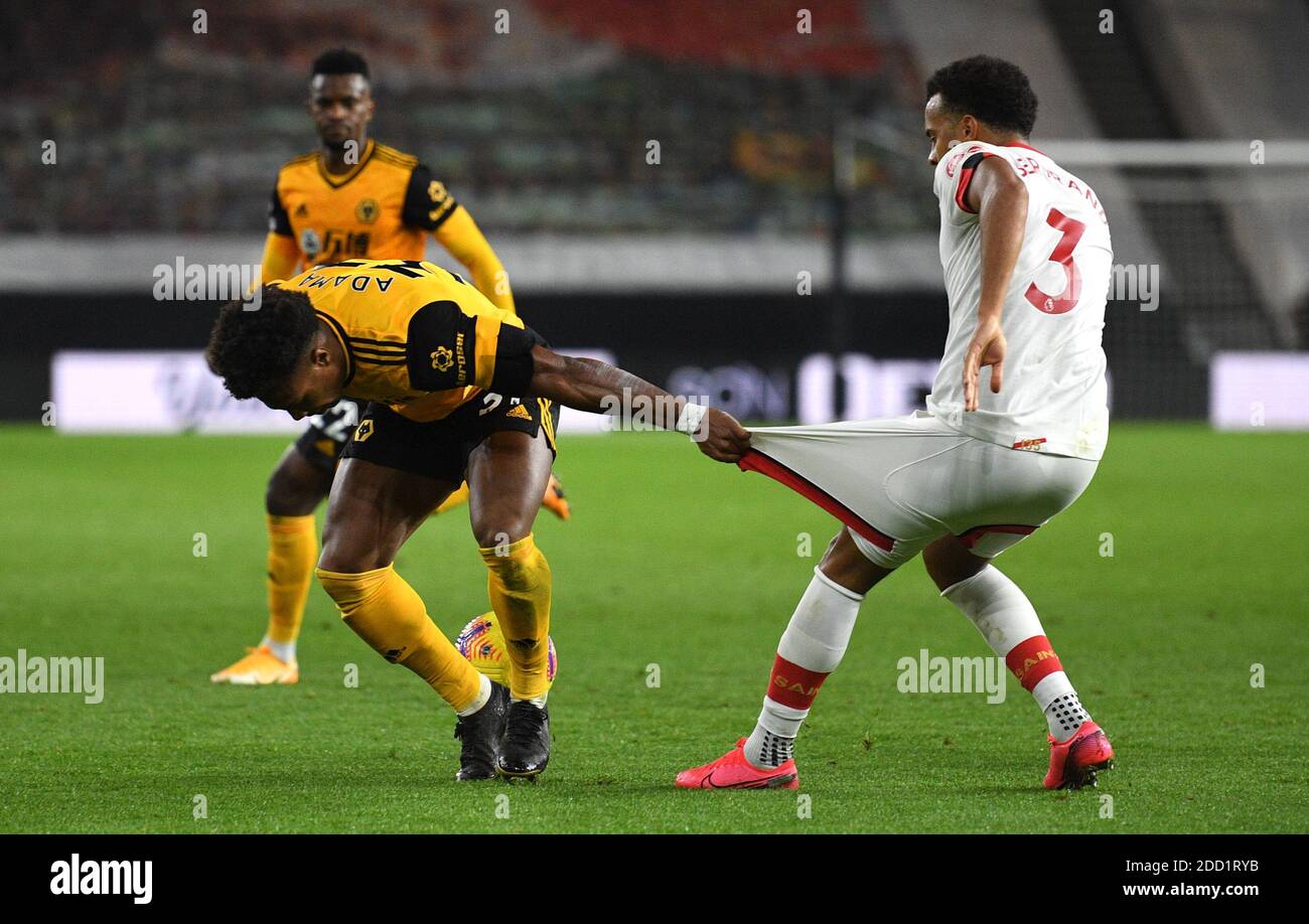 Wolverhampton Wanderers' Adama Traore grabs the shorts of Southampton's  Ryan Bertrand (right) during the Premier League match at Molineux,  Wolverhampton Stock Photo - Alamy