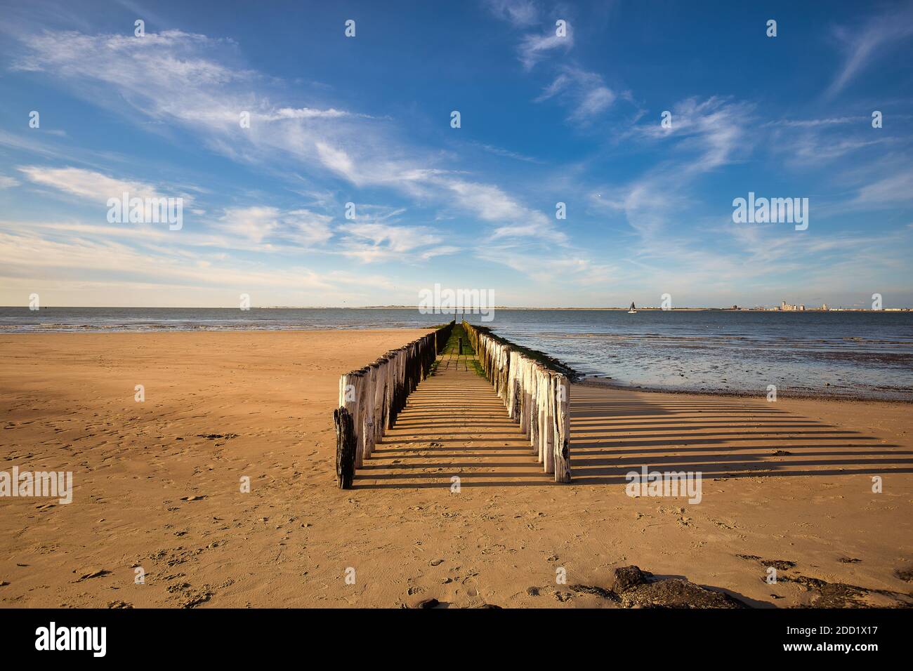 The beach of the dutch village Breskens on a warm summer day with low tide. Stock Photo