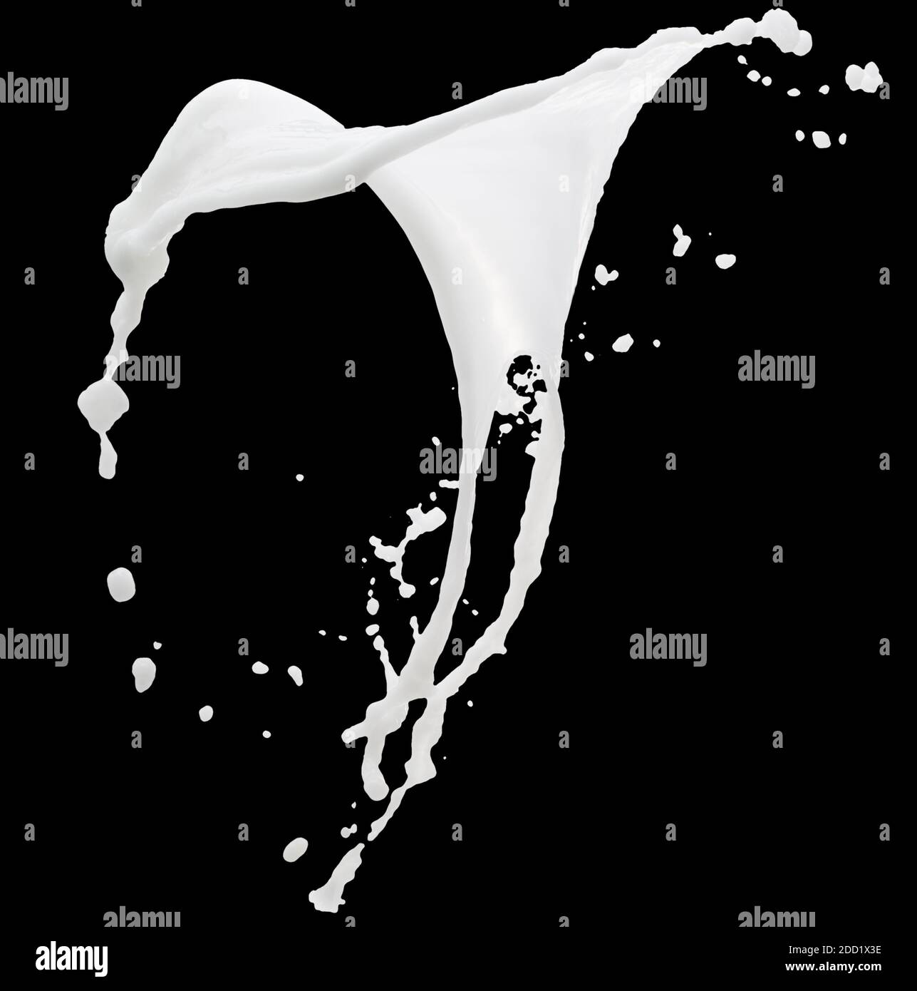 milk splash on a black background Stock Photo - Alamy