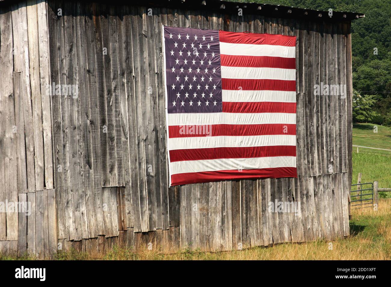 U.S. flag on a shed in rural Virginia, USA Stock Photo