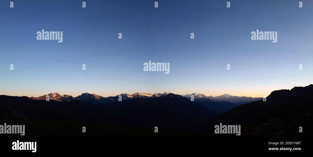 Panoramic view of the Alps in the border between Switzerland and Italy at sunset. Bellwald, Switzerland. Stock Photo