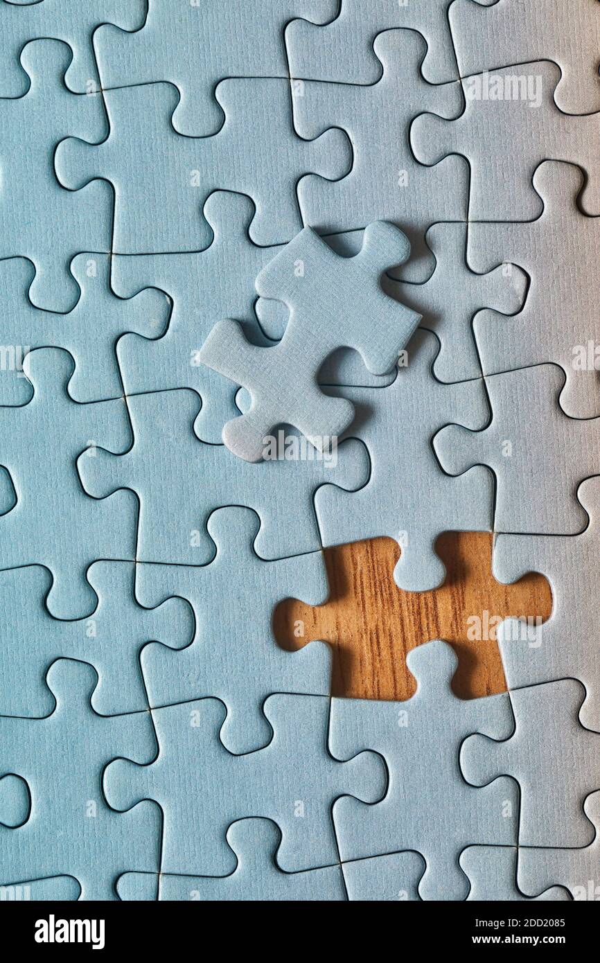 Jigsaw puzzle background, almost done Stock Photo - Alamy