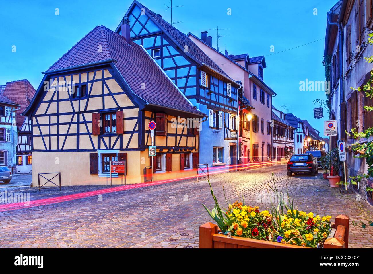 Night scene with beautiful typical half-timber houses in Bergheim, a well preserved medieval town in Alsace, France along the famous wine route. Stock Photo