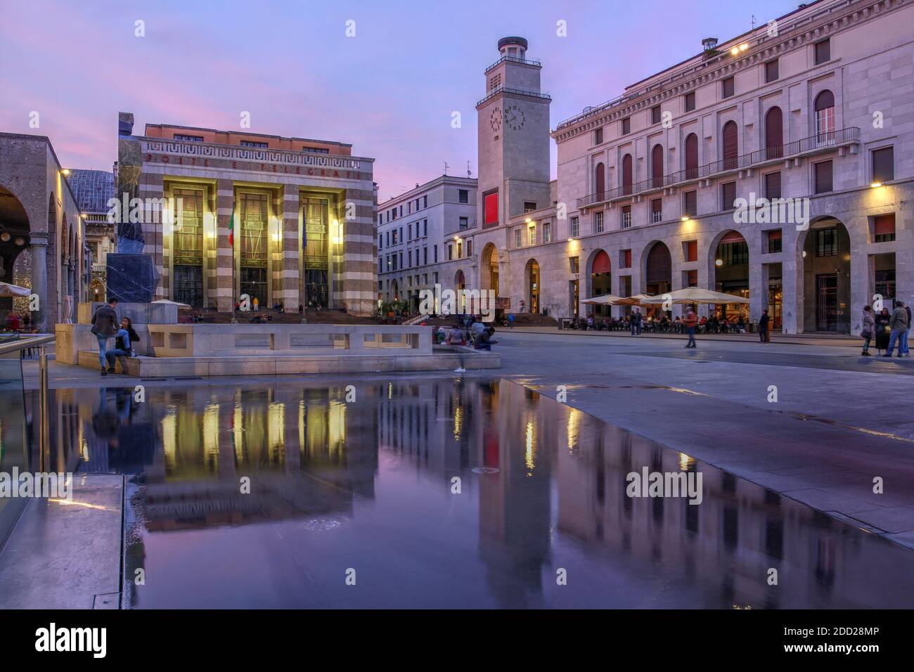 Twilight scene in Piazza della Vittoria (Victory Square) in Brescia, Italy. Stock Photo