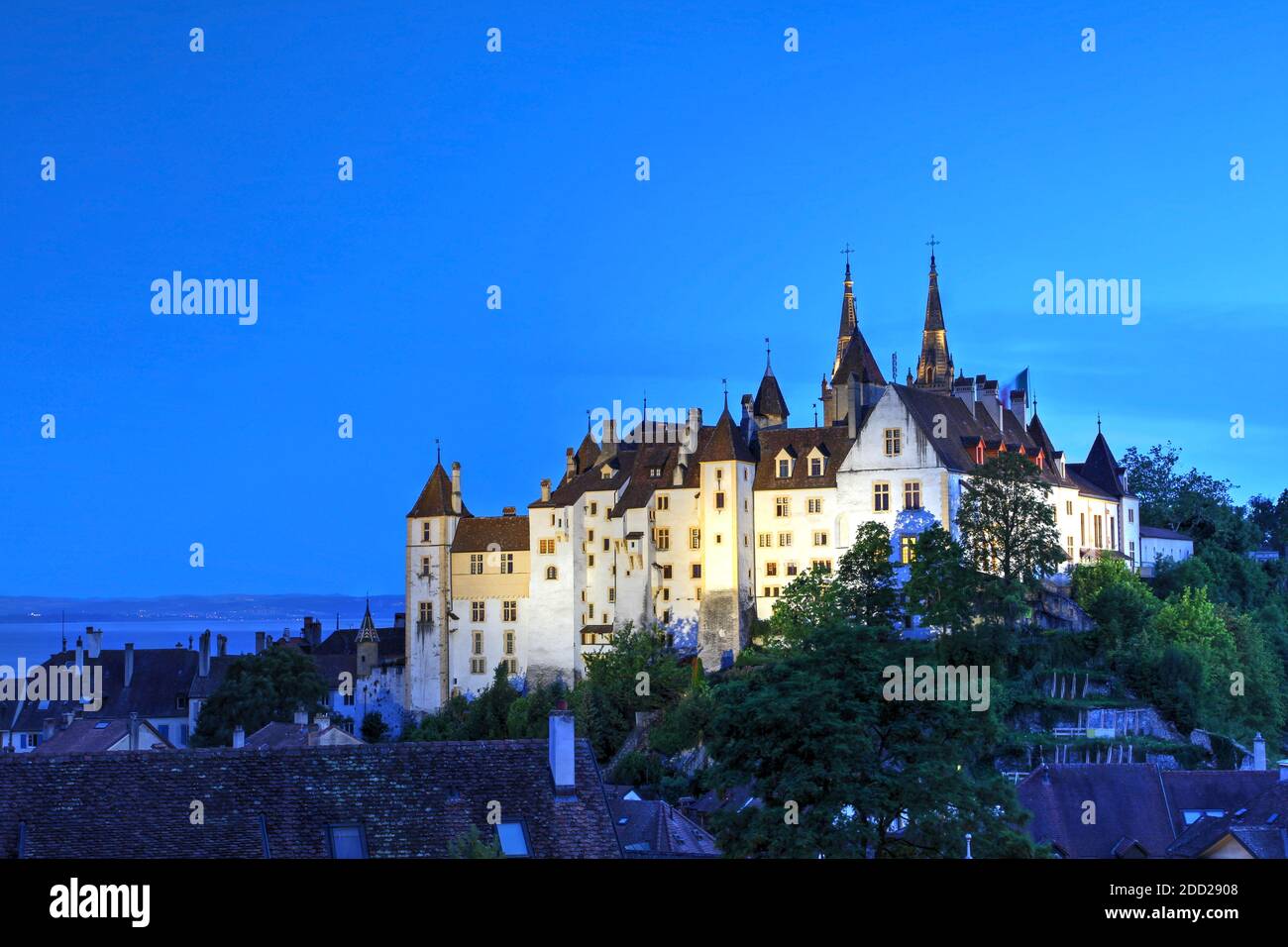 Skyline of Neuchatel, Switzerland featuring the Neuchatel Castle and the old town at night. Stock Photo