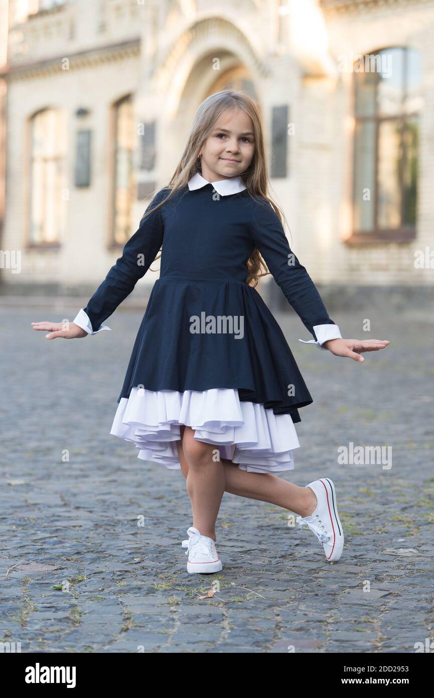Going to dance lesson. Little kid make curtsy outdoors. Small dancer wear  uniform. Ballet school. Dance education. Back to school fashion. Express  yourself Stock Photo - Alamy