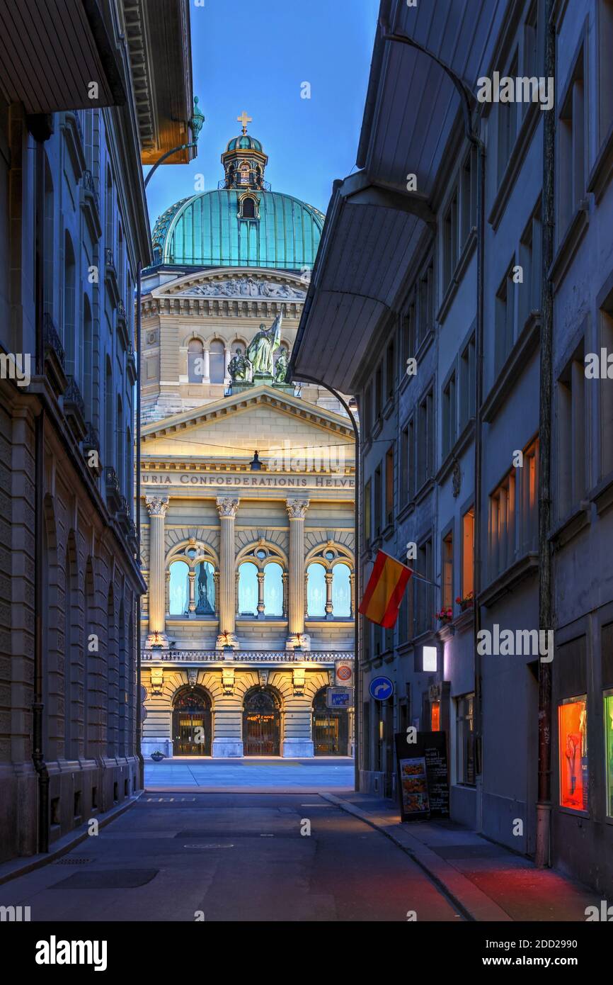 Vertical composition framed by a narrow alley of the Federal Palace (the seat of the Swiss Federal Assembly and the Federal Council) in Bern, Switzerl Stock Photo