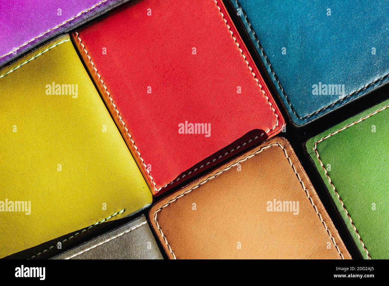 Handmade leather men's wallet. Multi-colored texture. Leather craft Stock Photo