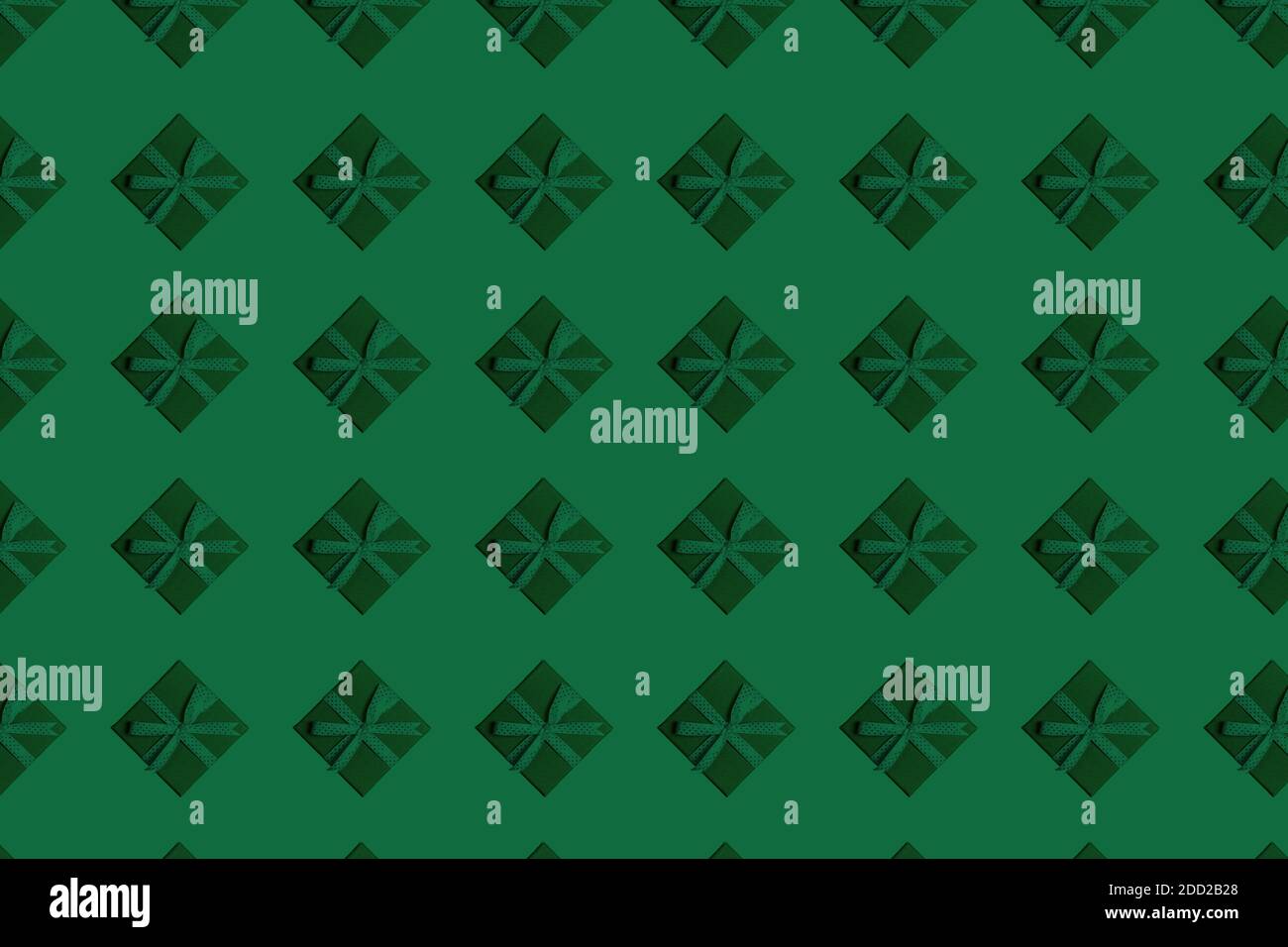 christmas pattern green gift boxes on background Stock Photo