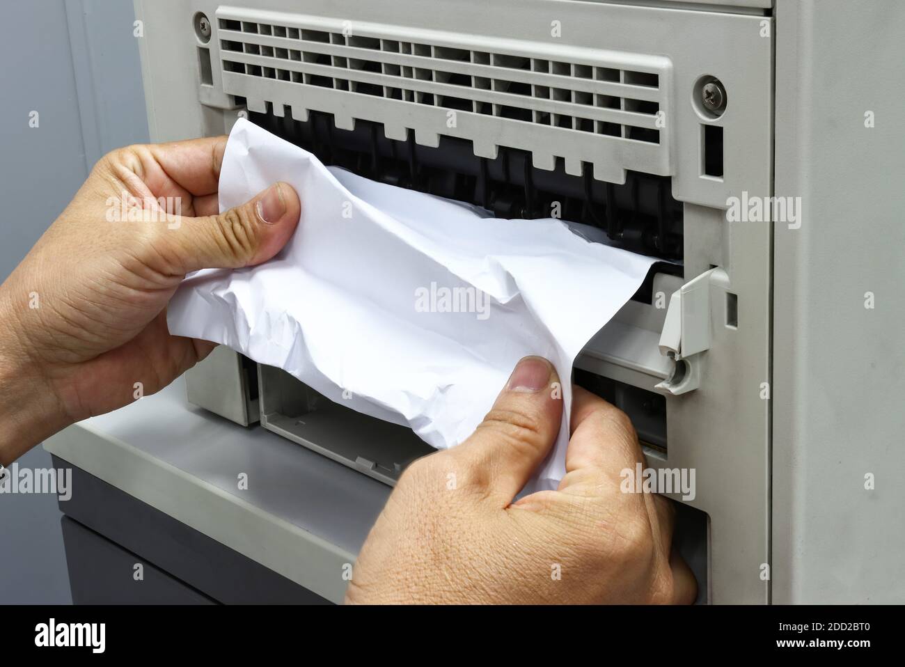 Technicians Removing Paper Stuck, Paper Jam In Printer At Office Stock