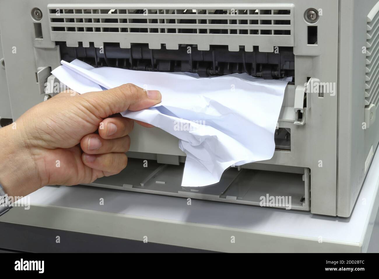 Technicians Removing Paper Stuck, Paper Jam In Printer At Office Stock