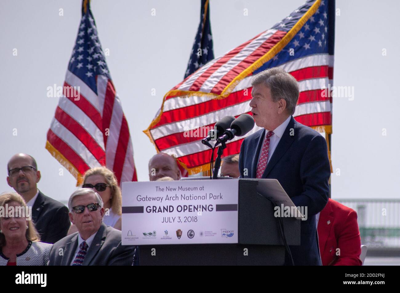 Giving speech at podium hi-res stock photography and images - Alamy