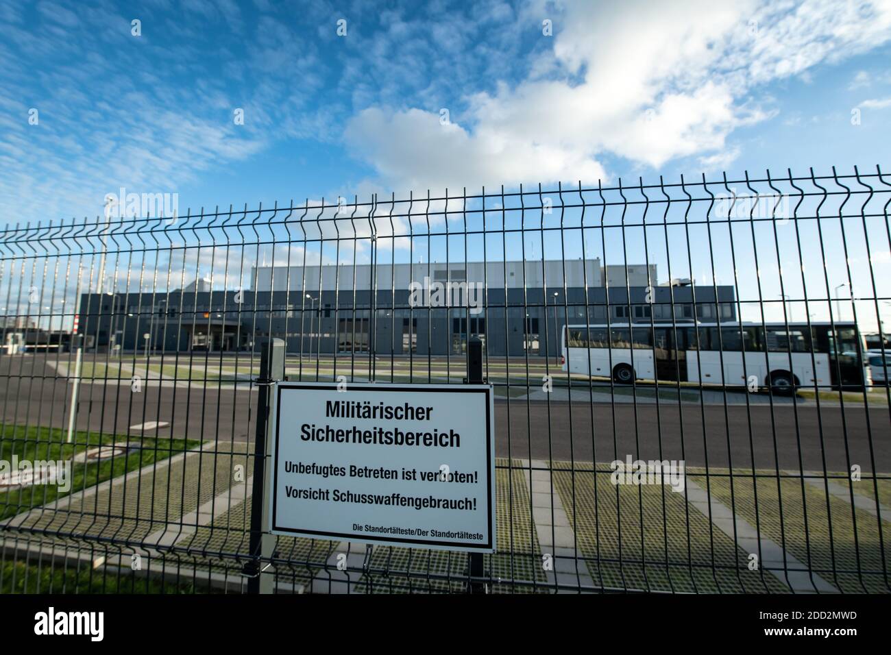 05 November 2020, Brandenburg, Schönefeld: 'Military Security Area' is written on a sign on the fence of the government terminal on the grounds of Berlin Brandenburg Airport (BER). Since the end of October 2020, the new government airport on the military part of the new Willy Brandt Airport is in operation. The new terminal in Schoenefeld serves the Federal Foreign Office and the Aircraft Readiness Department of the Federal Ministry of Defence (BMVg) as a check-in building for flights of the Federal Government and as a reception area for state visits. Photo: Bernd von Jutrczenka/dpa Stock Photo