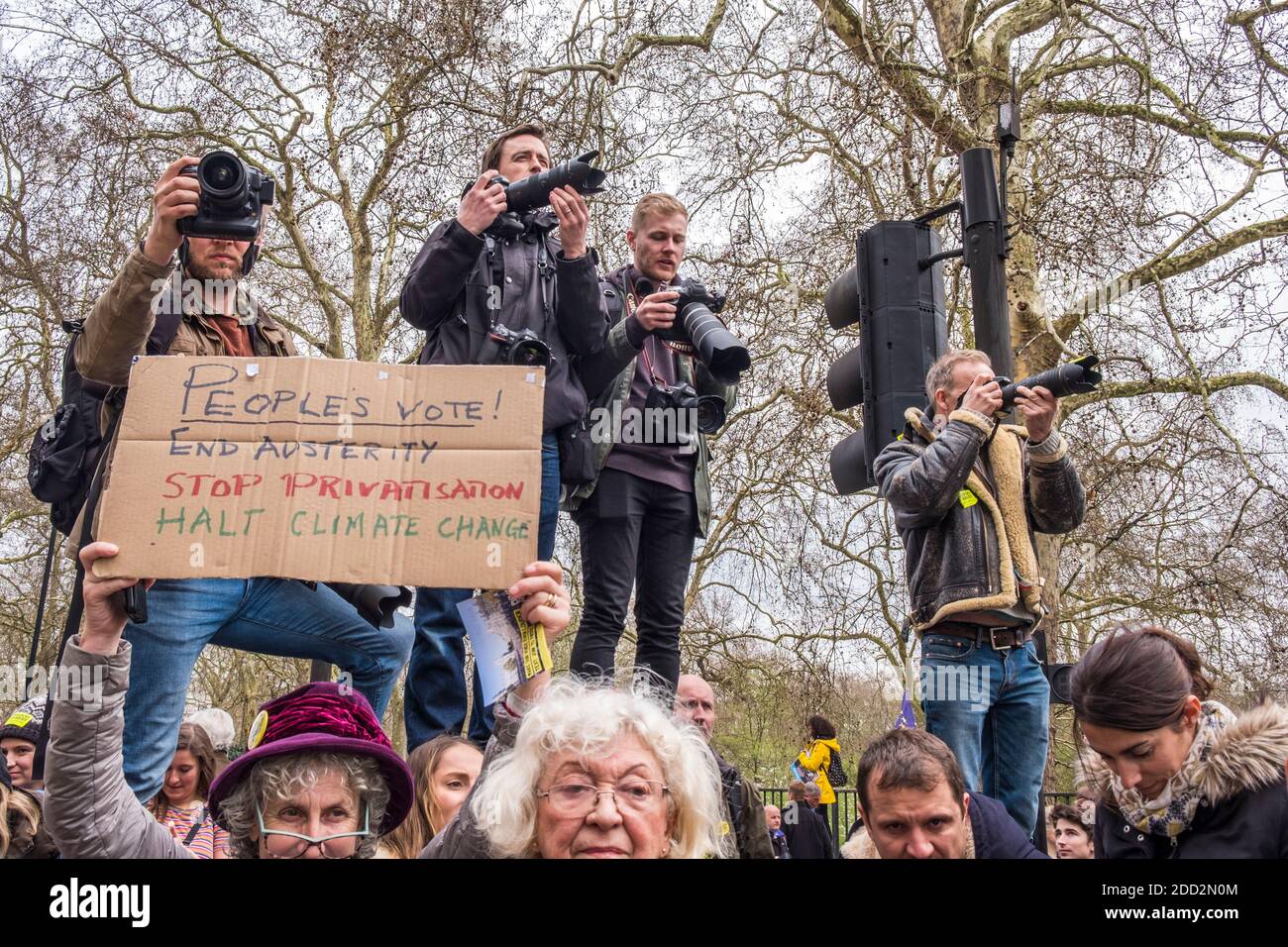 News photographers; protestors holding sign. People's Vote March, March 23rd 2019. London, England, GB, UK. Stock Photo