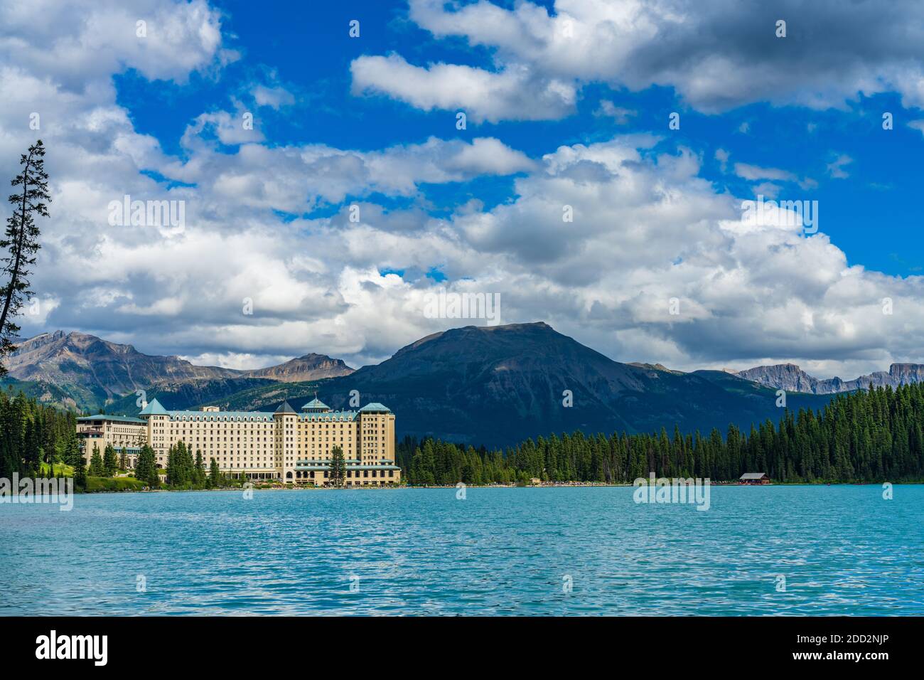 Fairmont Chateau Lake Louise in summer sunny day morning. Blue sky and ...