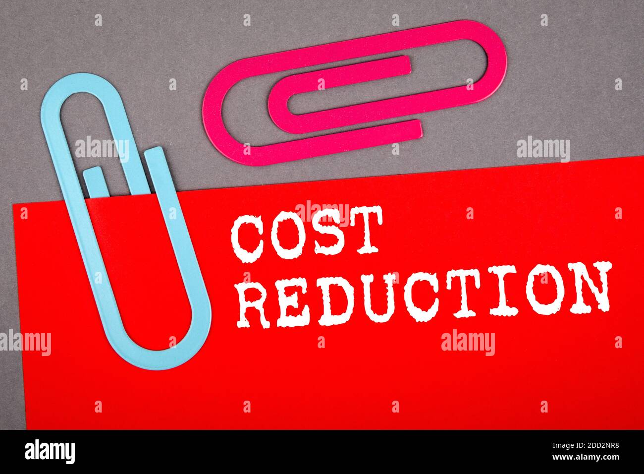 COST REDUCTION. Accounting, business, finance and investment concept