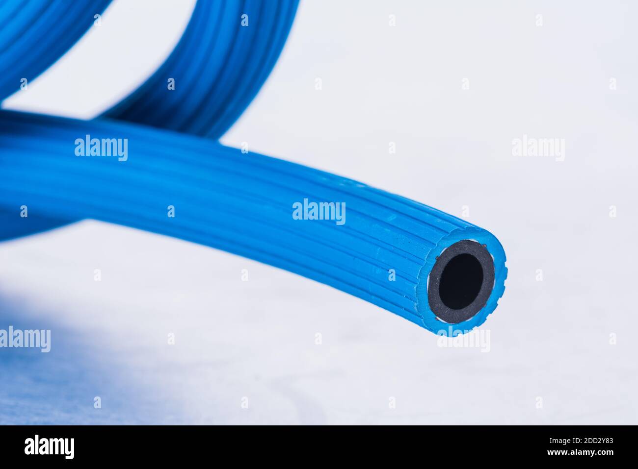Macro flexible hose for conveying oxygen in industrial applications Stock Photo