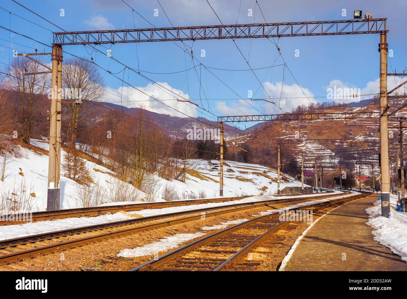 railway station in mountains. frosty winter landscape. transportation scenery Stock Photo