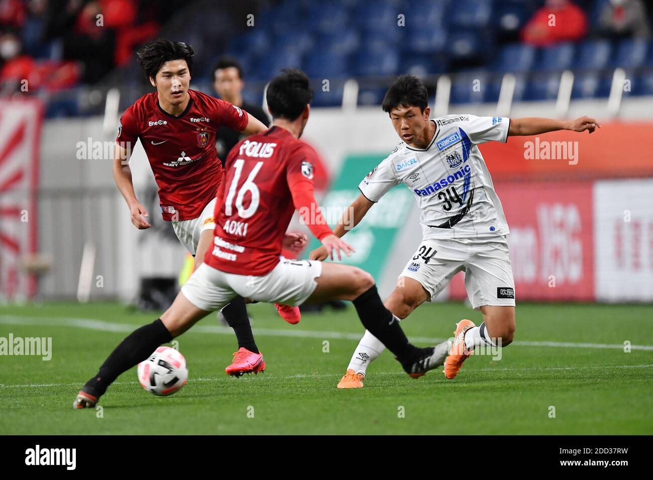 Saitama, Japan. 22nd Nov, 2020. Gamba Osaka's Shuhei Kawasaki (R ...
