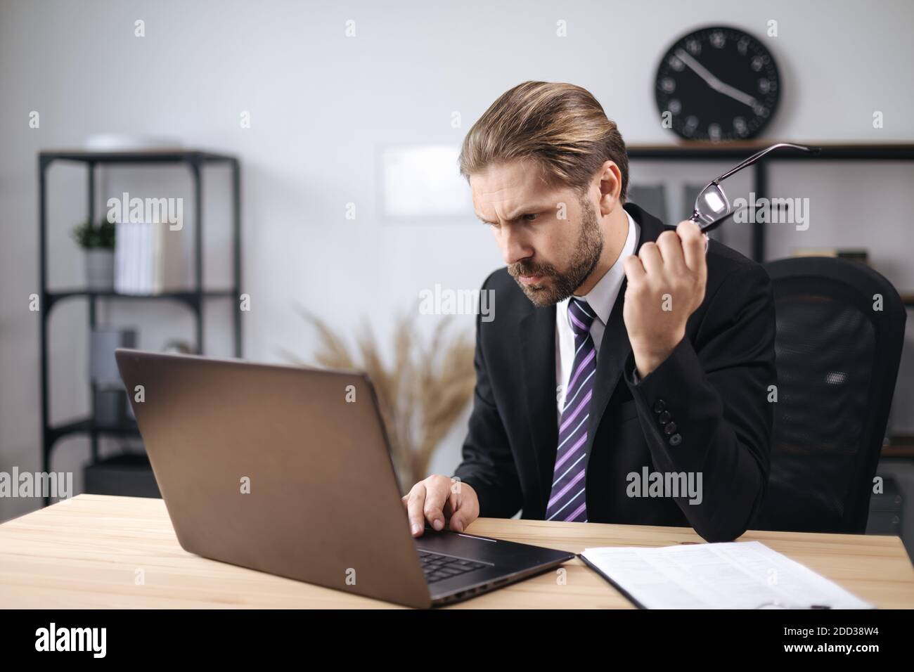 Focused handsome bearded man using hi-res stock photography and images ...