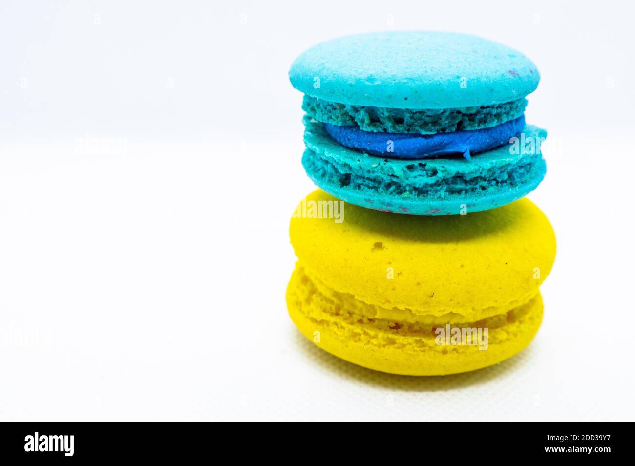 Macaroni are stacked one on top of the other in the form of a tower . isolated Stock Photo