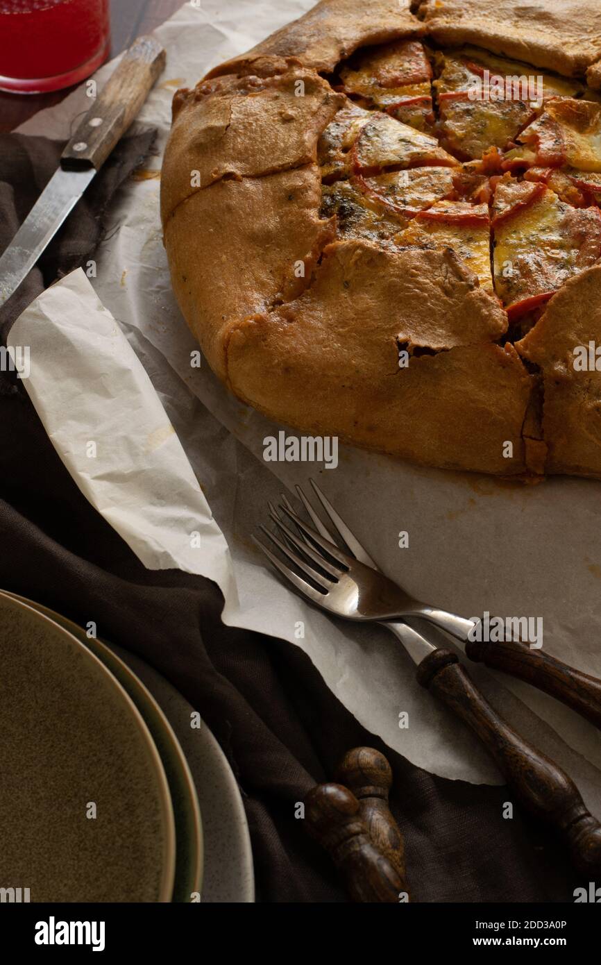 Ready to eat salt pie with vegetables, traditional homemade meal Stock Photo