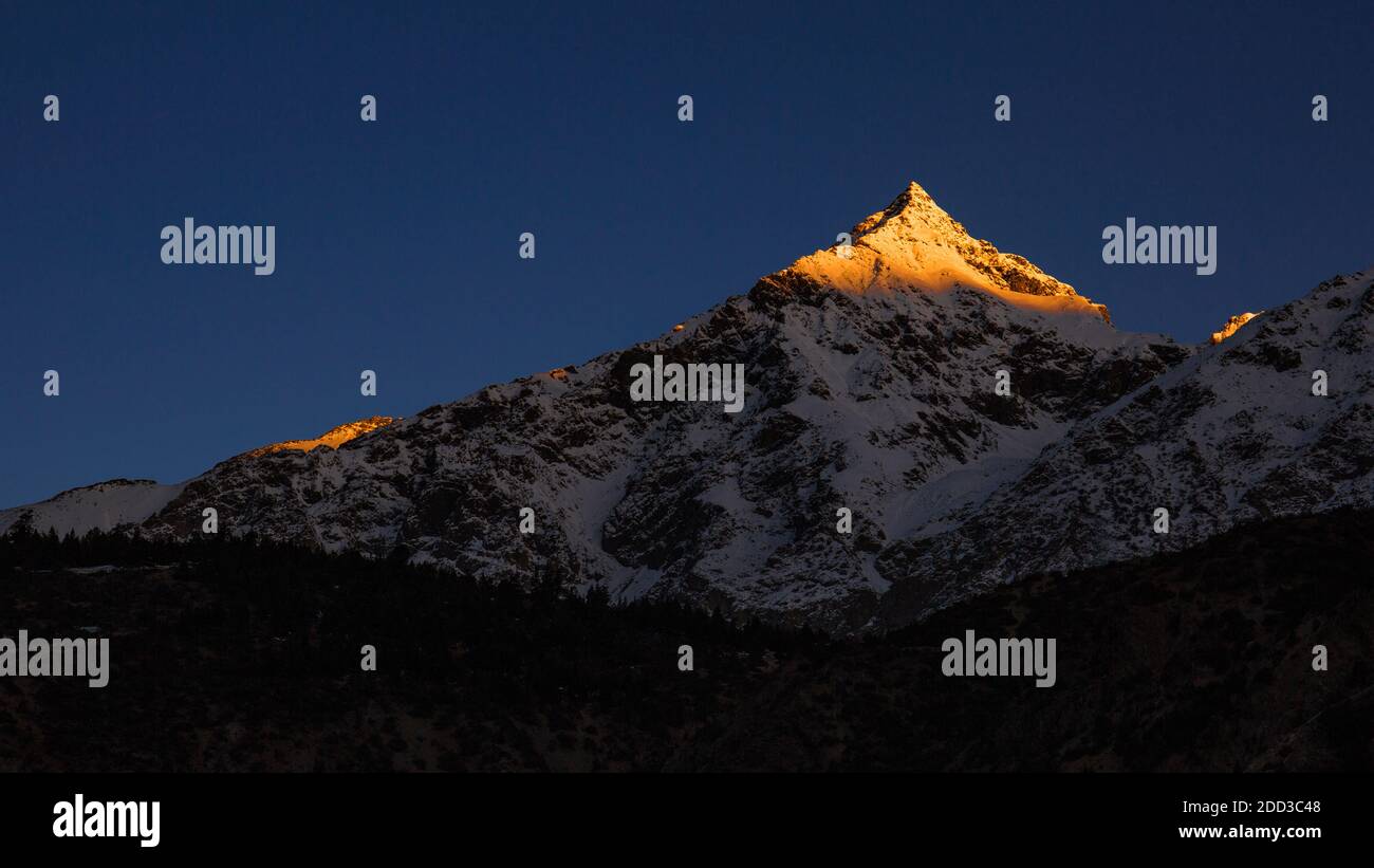 Snow mountain sunrise Stock Photo - Alamy