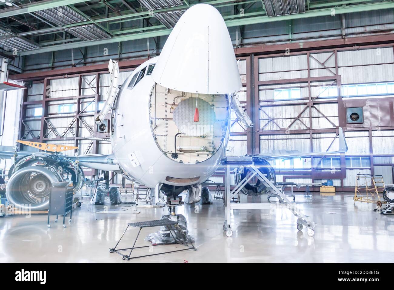 Passenger aircraft under maintenance. Checking mechanical systems of