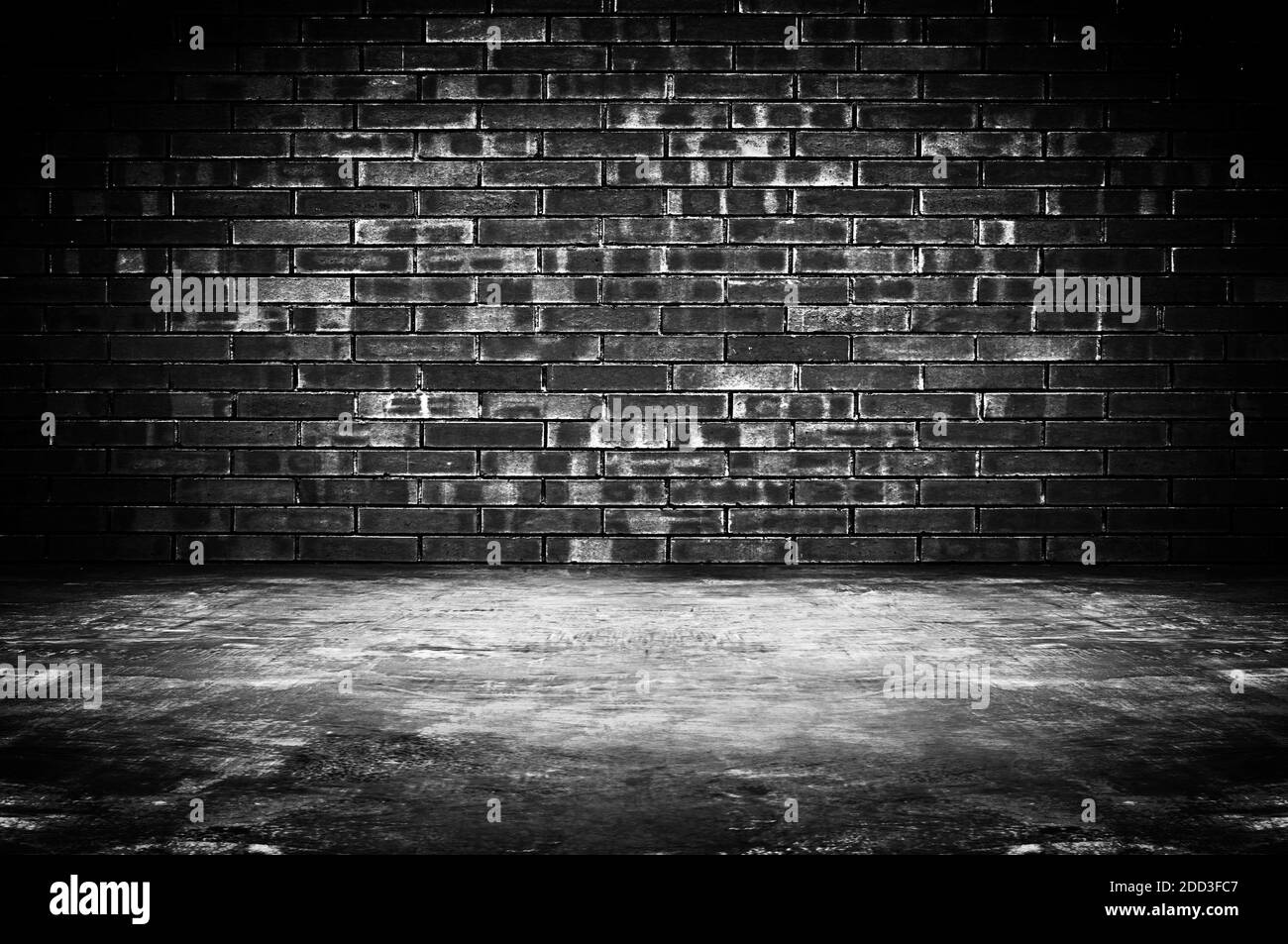 Old dark room with brick wall and concrete floor - as background Stock  Photo - Alamy