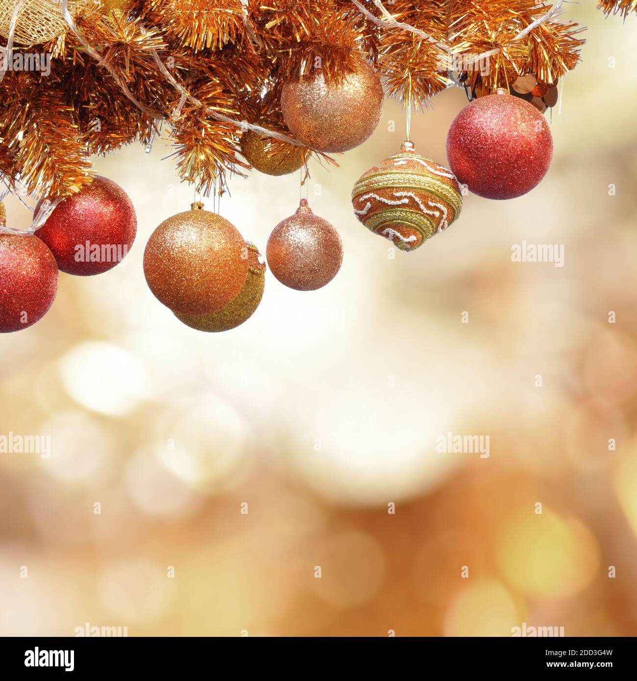 Christmas ornaments on lens flare background Stock Photo