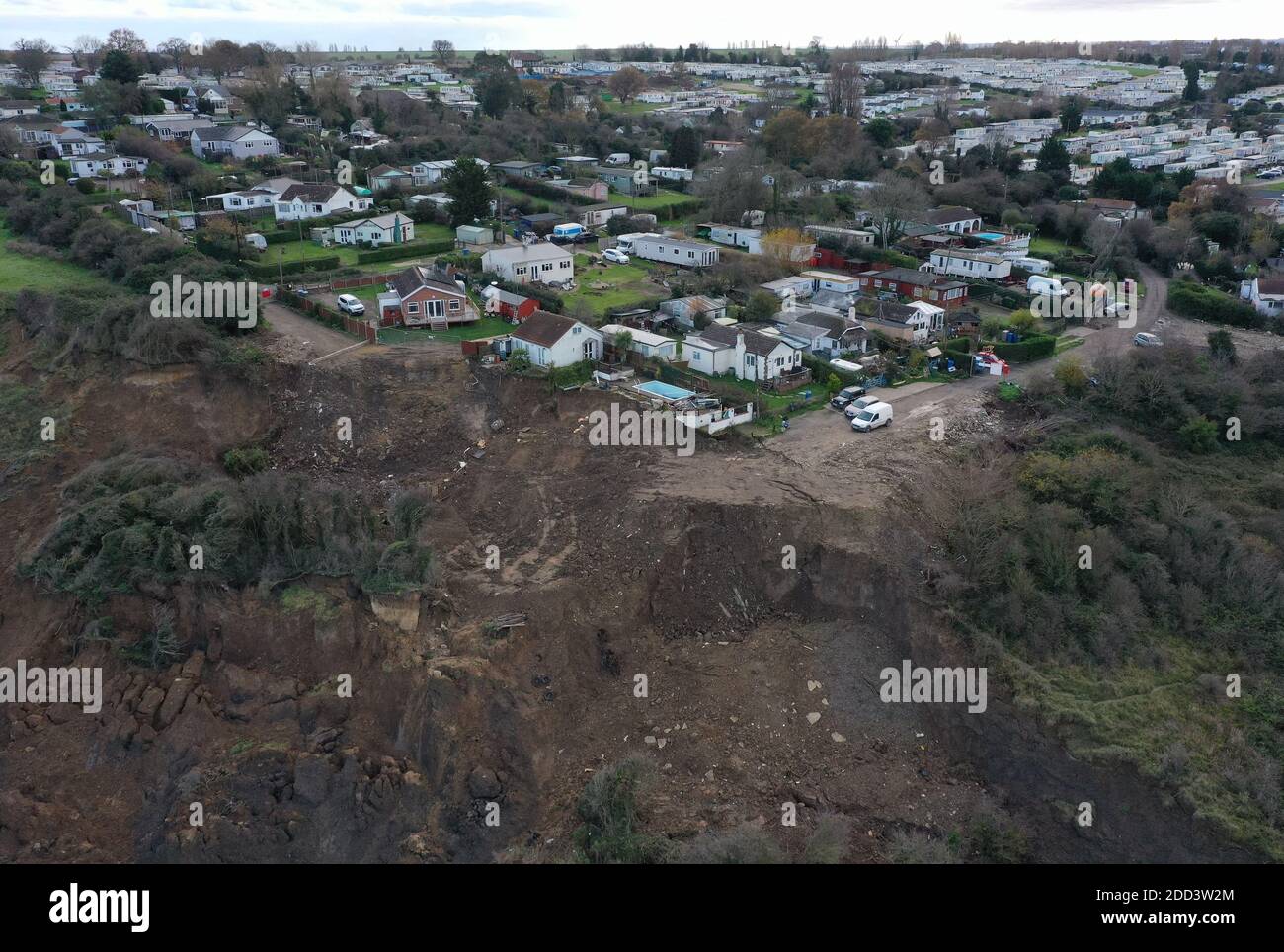 Houses on the cliff edge in Eastchurch, Kent, as residents trying to ...