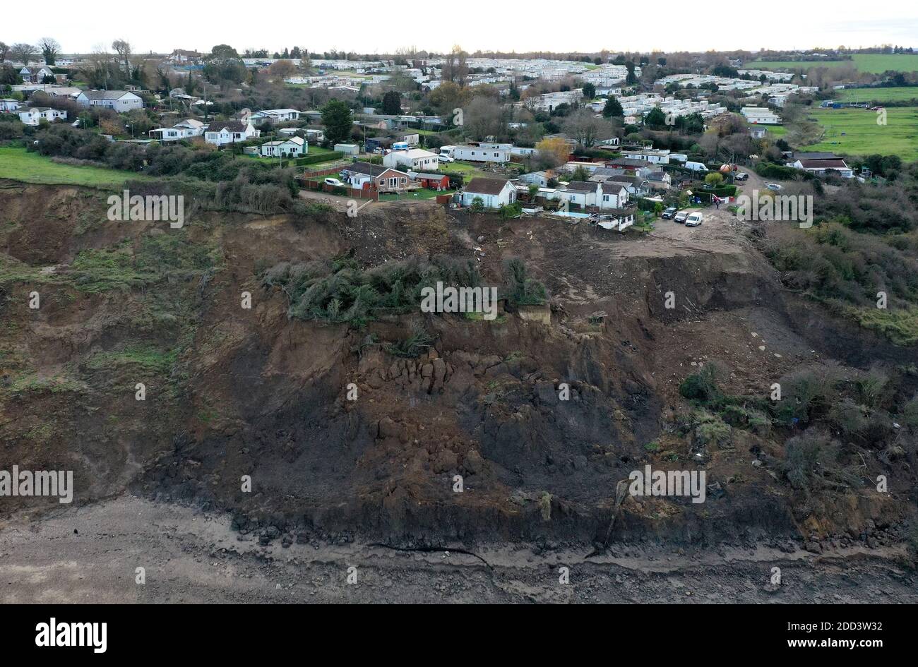 Houses on the cliff edge in Eastchurch, Kent, as residents trying to ...