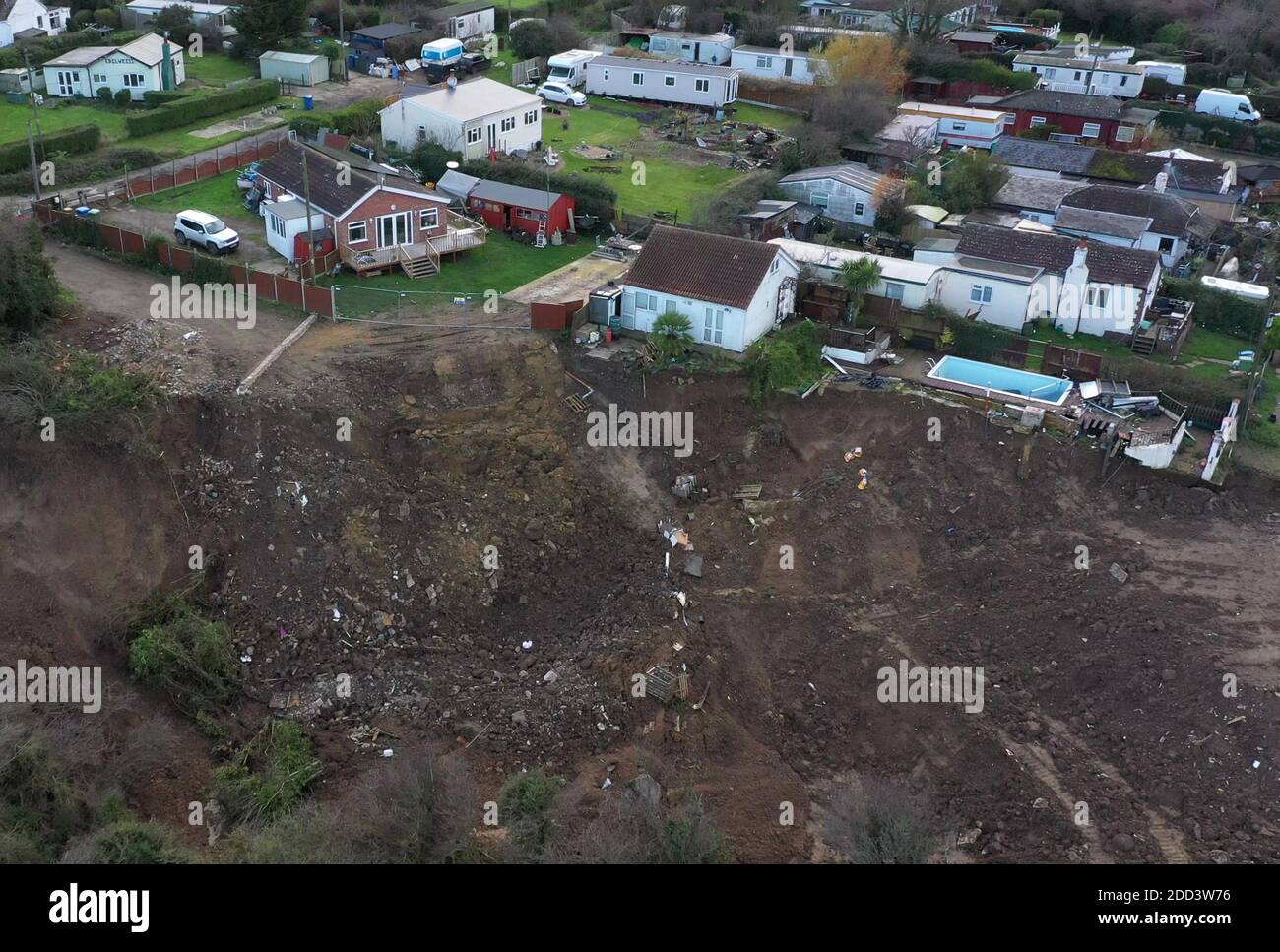 Houses on the cliff edge in Eastchurch, Kent, as residents trying to ...