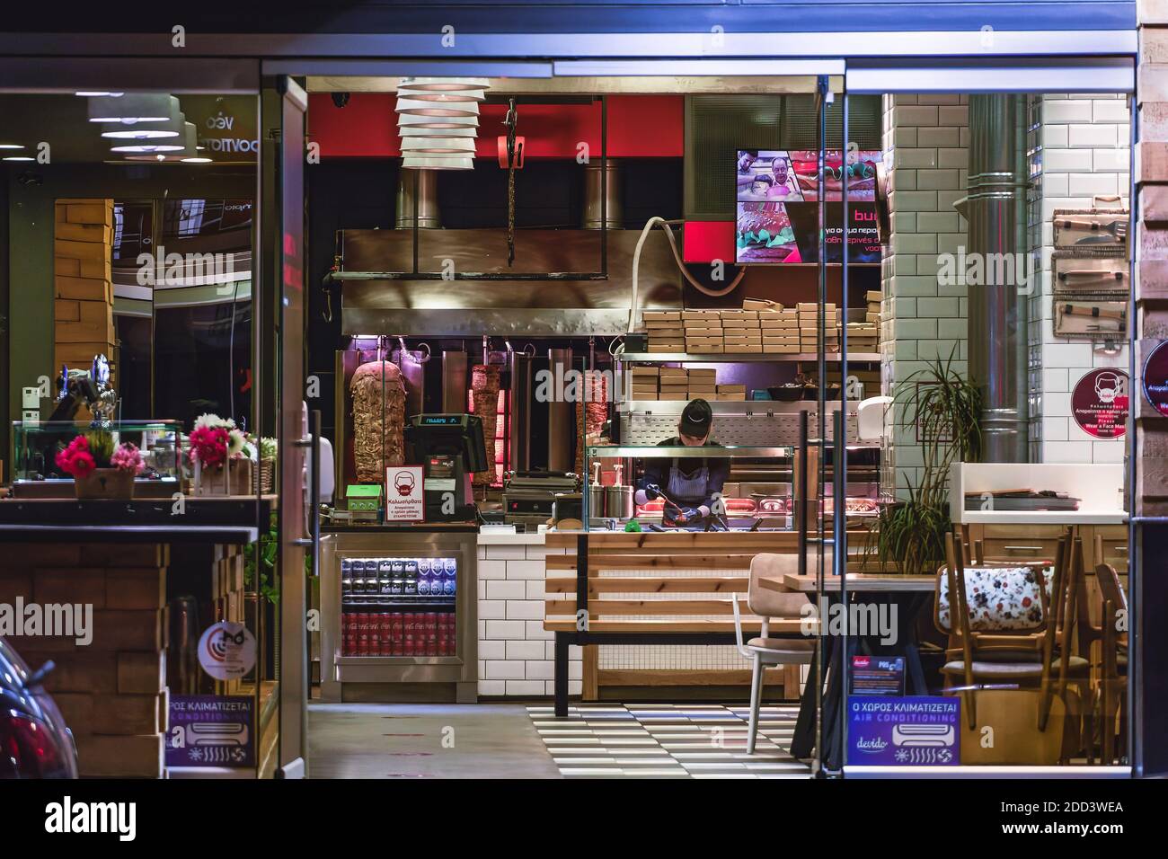 Thessaloniki, Greece - November 22 2020: Hellenic empty gyros shop without  crowd. Illuminated night view of grill restaurant only accepting orders for  take away & deliveries, due to covid-19 measures Stock Photo - Alamy