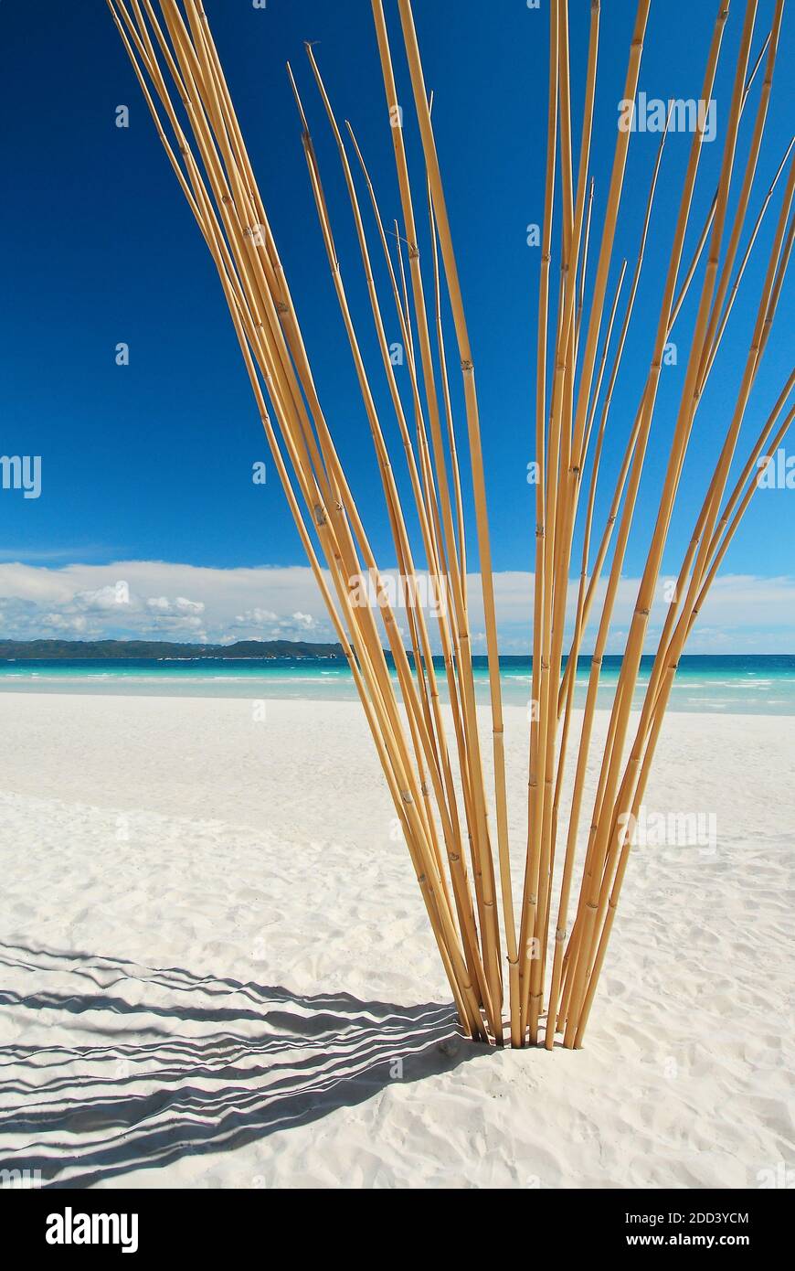 Beautiful clean empty sandy White Beach with bamboo artwork against a blue sky on Boracay Island, Aklan Province, Visayas, Philippines, Asia Stock Photo
