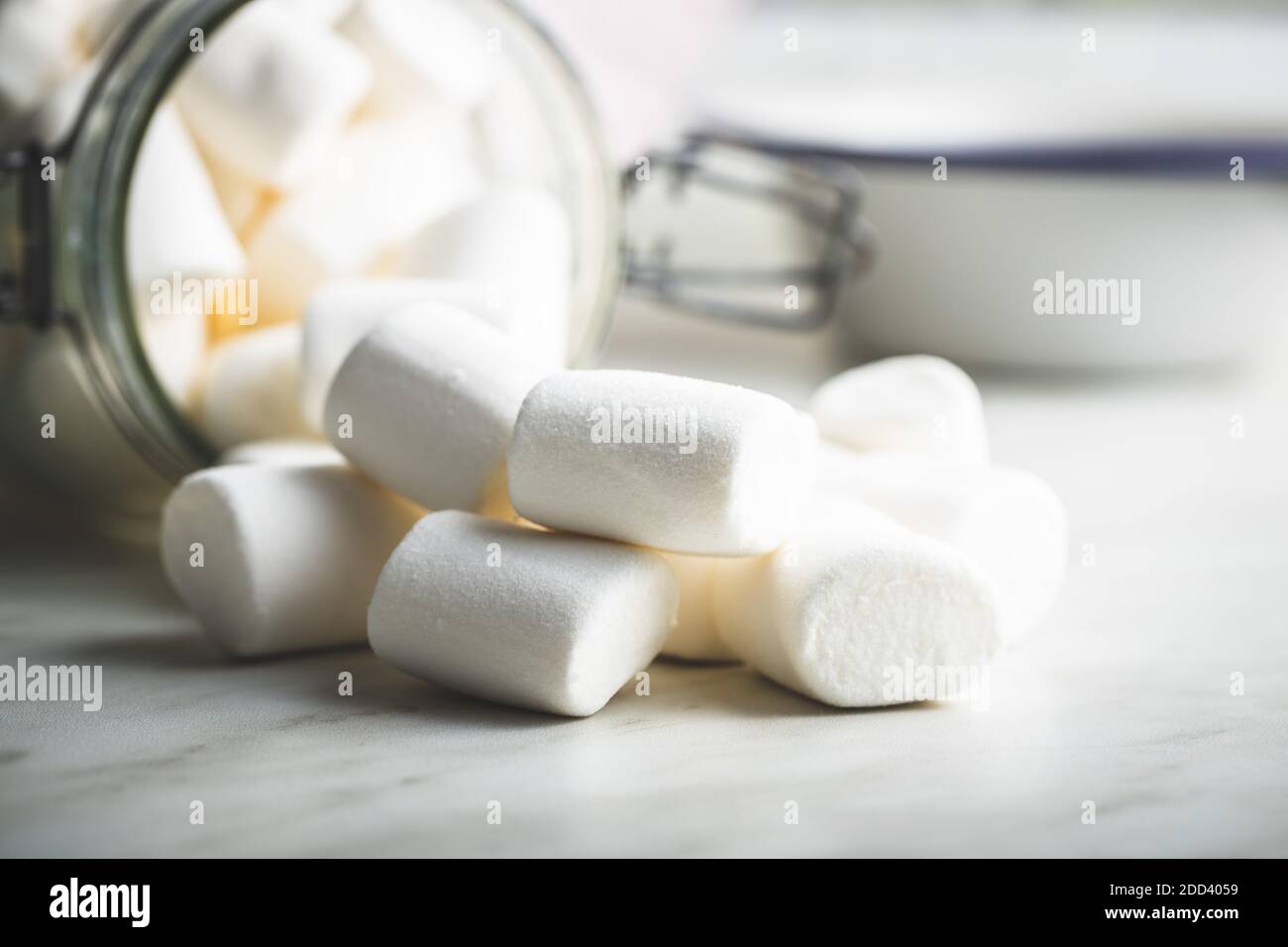 White sweet marshmallows candy on kitchen table Stock Photo Alamy