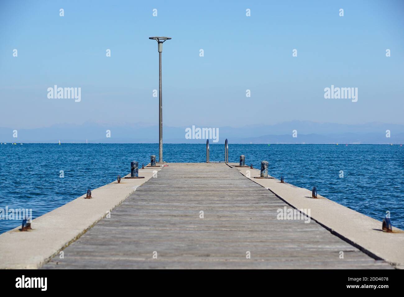 Pier in the sea . jetty over the beautiful sea with blue sky Stock Photo